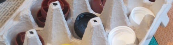Close Up Egg Carton Cap Sorting