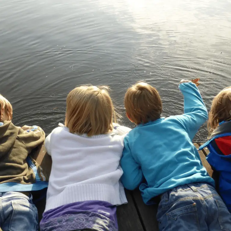 Kids looking at a pond