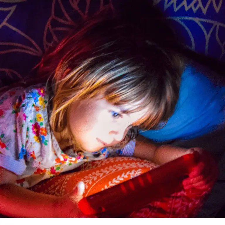Child staring at a screen