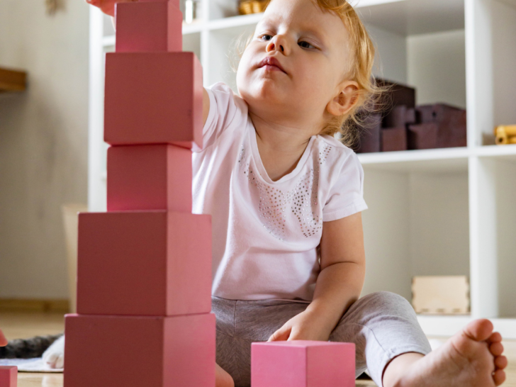 a-young-child-building-the-pink-tower